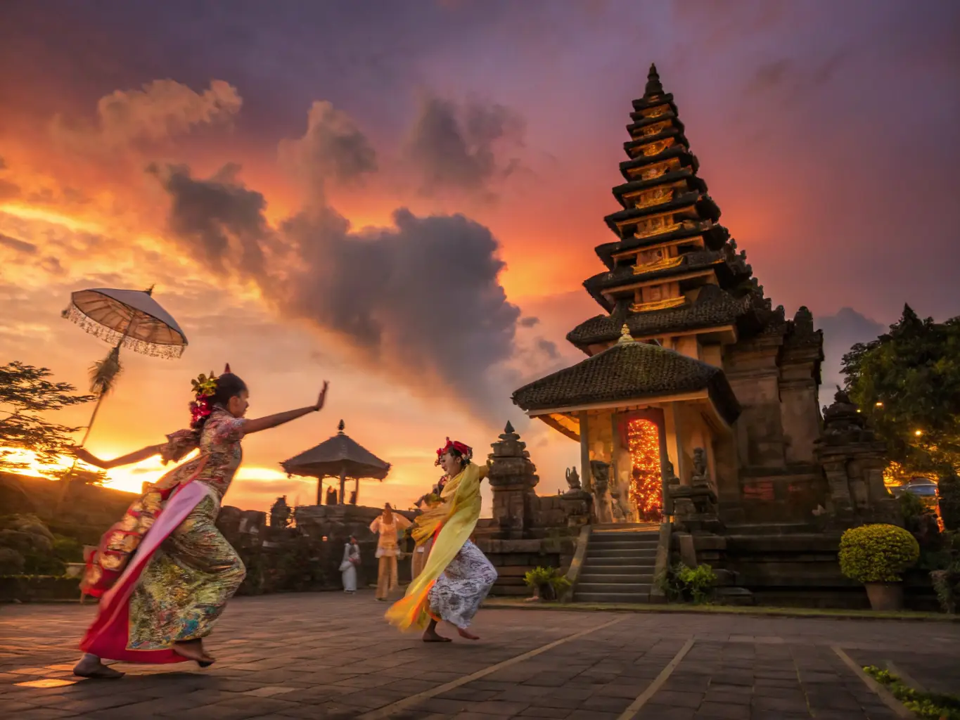 A captivating image of a traditional Balinese dance performance, featuring dancers in elaborate costumes and intricate movements, set against the backdrop of a historic temple.